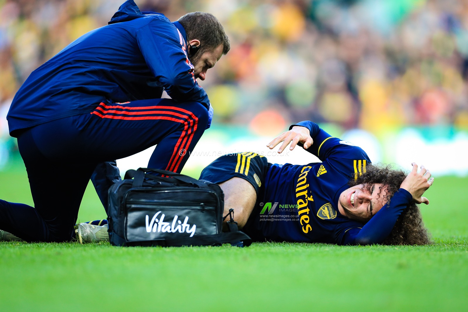 1st December 2019, Carrow Road, Norwich, England; Premier League, Norwich City v Arsenal : Matteo Guendouzi (29) of Arsenal  receives treatment on the pitch 

Credit: Georgie Kerr/News Images