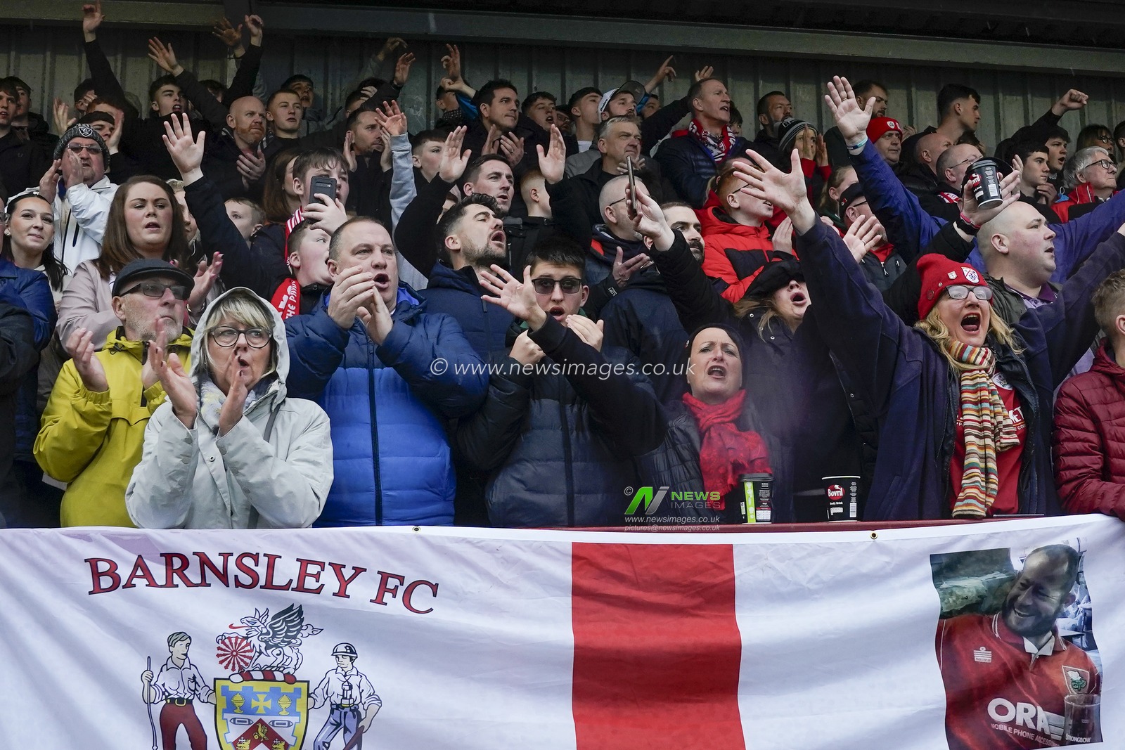 Barnsley fans sing and applaud on the 12th minute for Beth Sefton a member of the Barnsley staff 12 months after her illness during the Sky Bet League 1 match Fleetwood Town vs Barnsley at Highbury Stadium, Fleetwood, United Kingdom, 17th February 2024

(Photo by Steve Flynn/News Images)