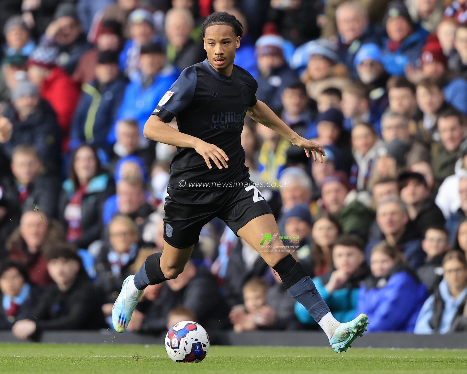 Etienne Camara #24 of Huddersfield Town runs with the ball during the  Sky Bet Championship match Burnley vs Huddersfield Town at Turf Moor, Burnley, United Kingdom, 25th February 2023

(Photo by Conor Molloy/News Images)