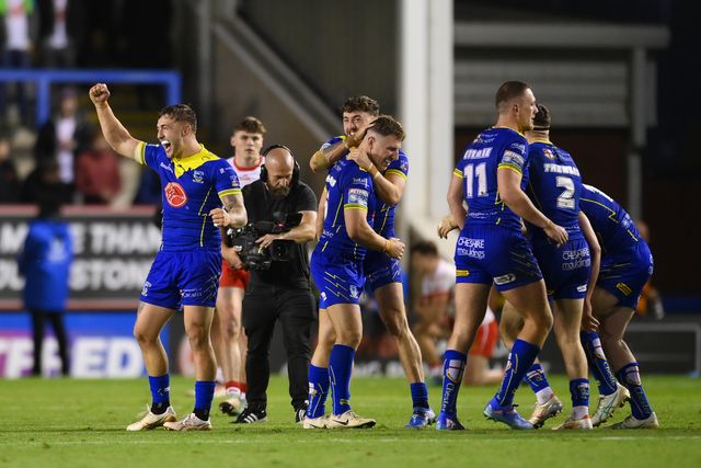 Players of Warrington Wolves celebrate following the Betfred Super League play-off Eliminator 2 Warrington Wolves v St Helens at Halliwell Jones Stadium, Warrington, United Kingdom, 28th September 2024

(Photo by Ben Roberts/News Images)