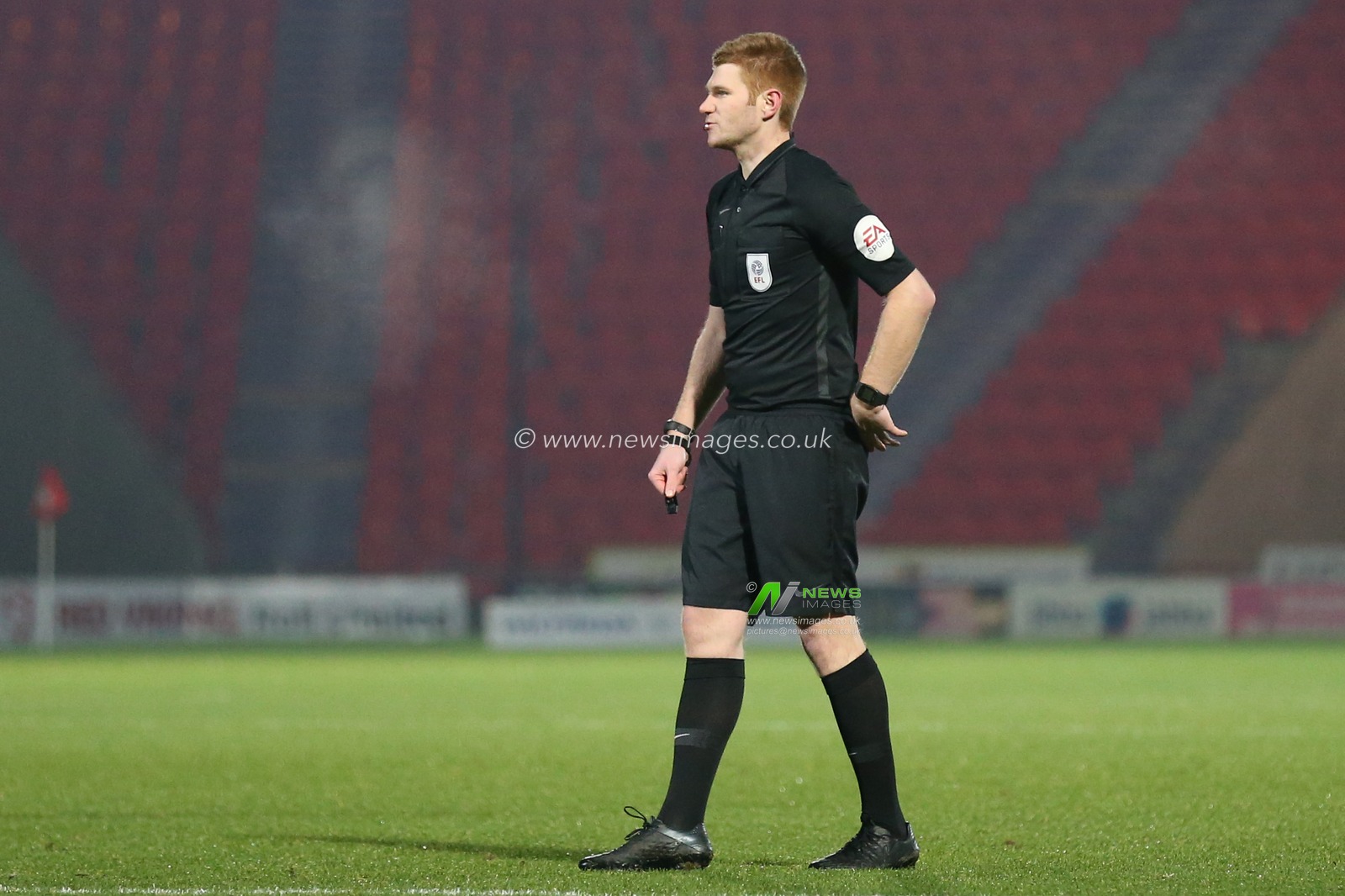 referee James Oldham during the game