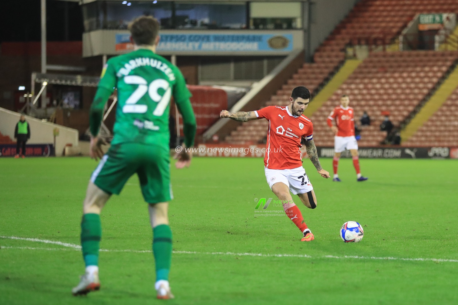 Alex Mowatt #27 of Barnsley scores to make it 1-1