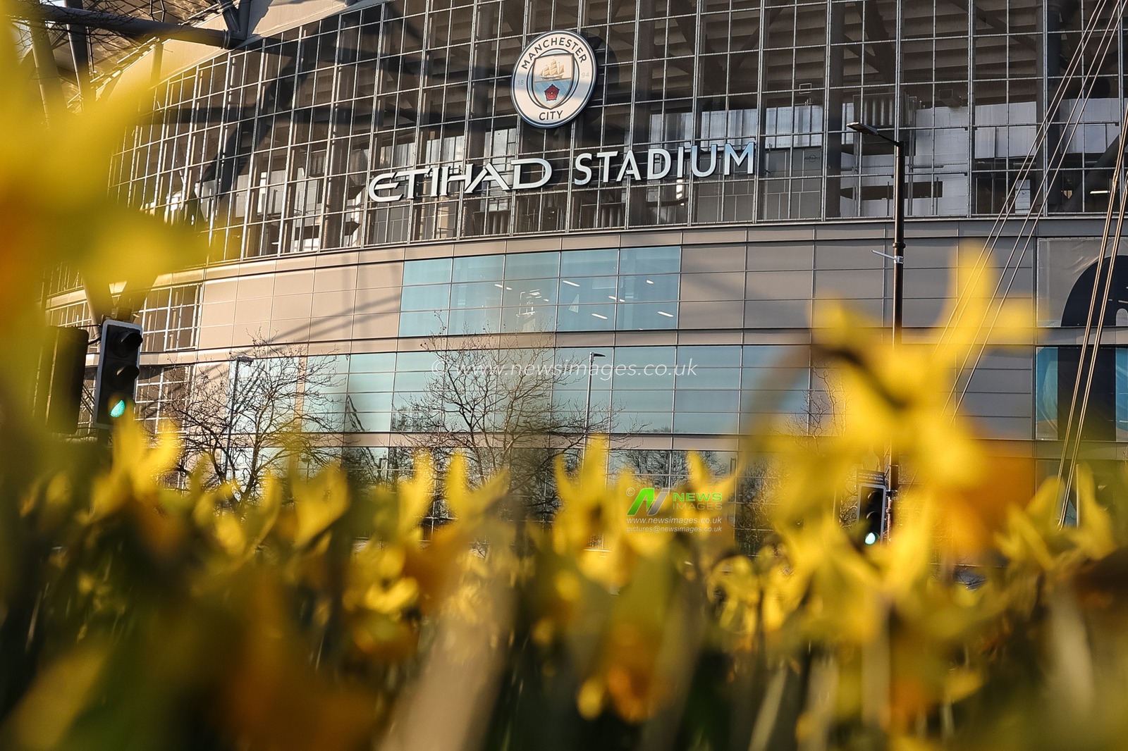 A general view of the Etihad Stadium through a bed of daffodils during the Premier League match Manchester City vs Nottingham Forest at Etihad Stadium, Manchester, United Kingdom on 04 March 2026

(Photo by Mark Cosgrove/News Images)