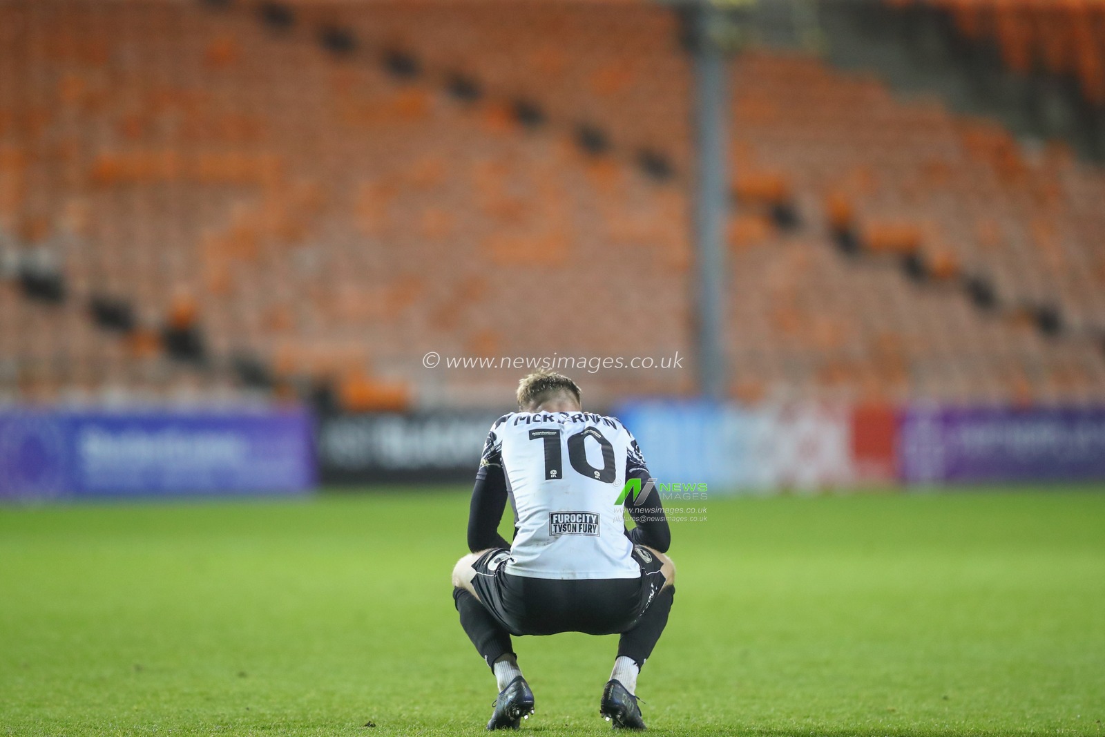 JJ McKiernan #10 of Morecambe reacts to his team's loss after the Bristol Street Motors Trophy match Blackpool vs Morecambe at Bloomfield Road, Blackpool, United Kingdom, 14th November 2023

(Photo by Gareth Evans/News Images)