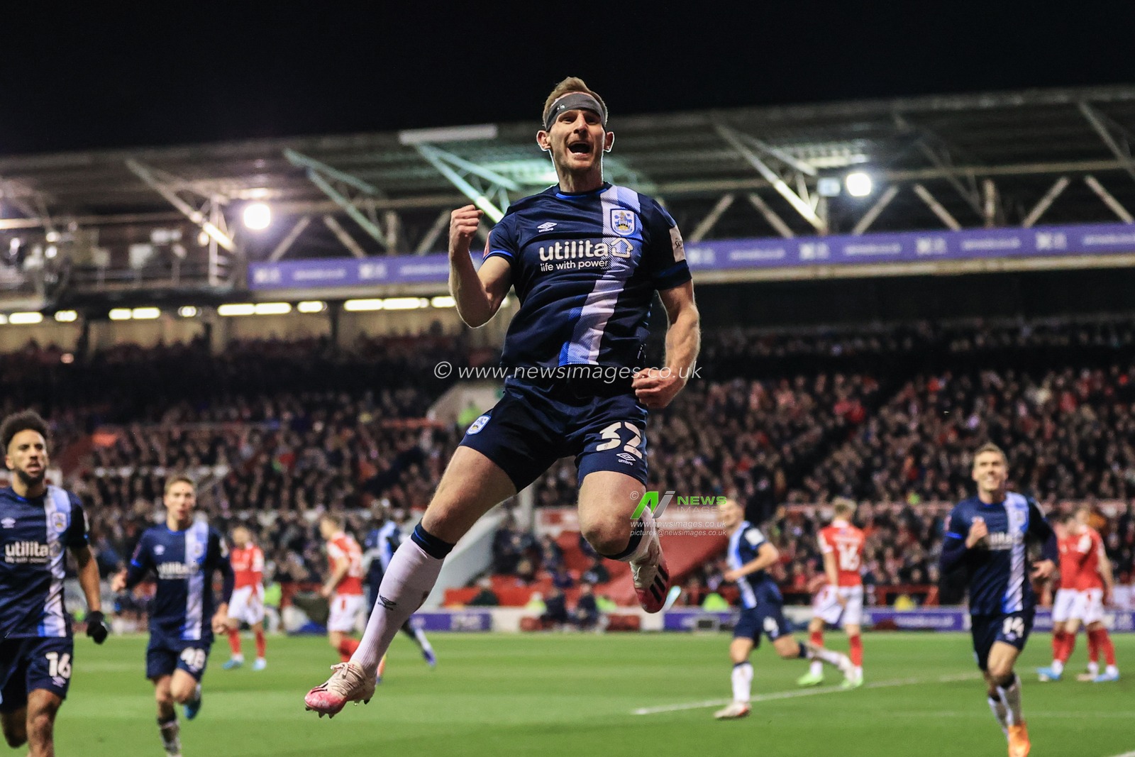 Tom Lees #32 of Huddersfield Town celebrates his goal to make it 0-1