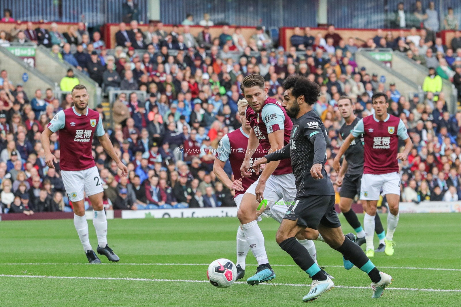 31st August 2019, Turf Moor, Burnley, England ; Premier League Football, Burnley vs Liverpool : Mohamed Salah (11) of Liverpool wins the ball in the area 

Credit: Mark Cosgrove/News Images

English Football League images are subject to DataCo Licence