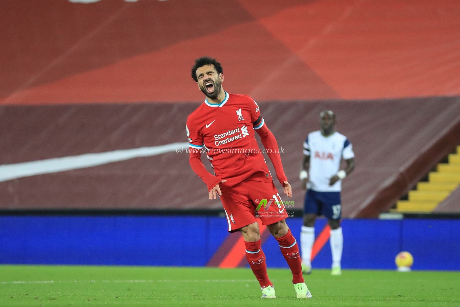 Mohamed Salah #11 of Liverpool reacts as he misses an opportunity on goal