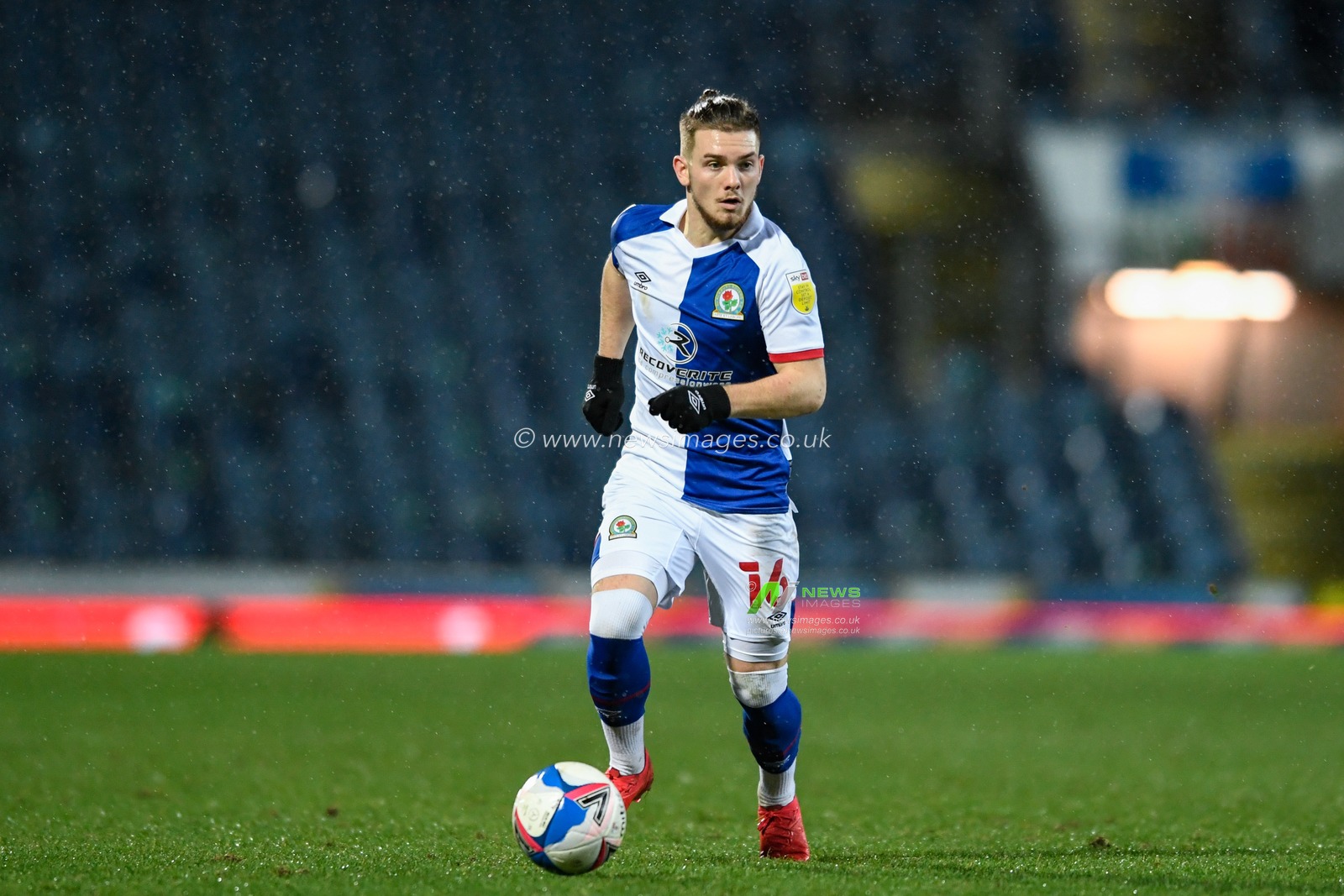 Harvey Elliott #16 of Blackburn Rovers runs forward with the ball