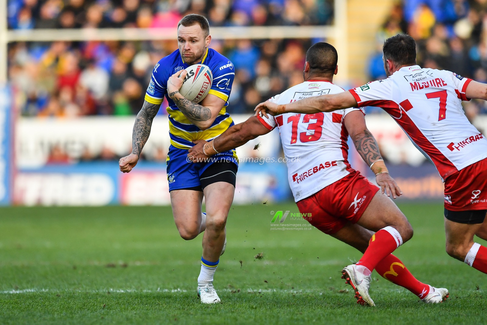9th February 2019 , Halliwell Jones Stadium, Warrington, England;  Betfred Super League, Round 2, Warrington Wolves vs Hull KR  ; Blake Austin (6) of Warrington evades the tackle of Weller Hauraki  (13) of Hull KR 

Credit: Craig Thomas/News Images