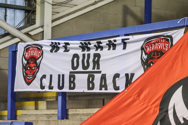 Salford fans protest against their clubs owners during the Betfred Super League Round 24 match Warrington Wolves vs Salford Red Devils at Halliwell Jones Stadium, Warrington, United Kingdom, 29th August 2025

(Photo by Alfie Cosgrove/News Images)