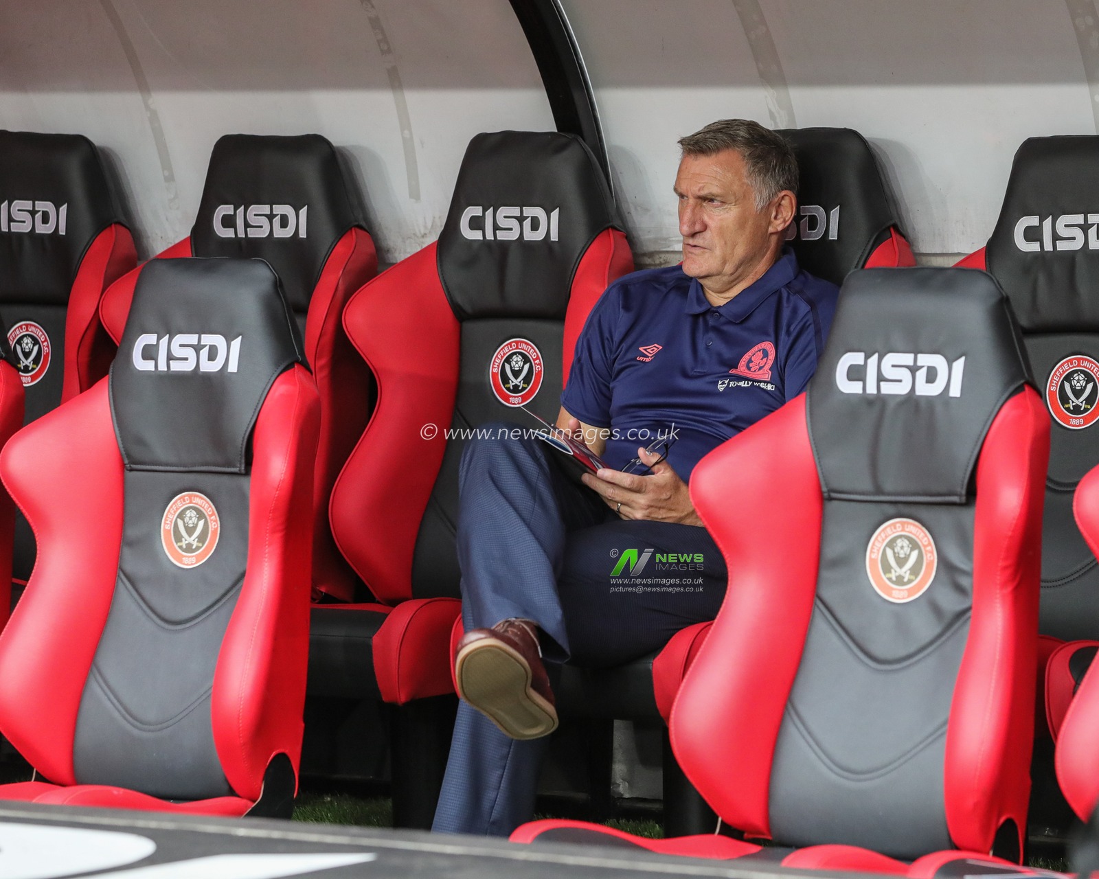 27th August 2019 , Bramall Lane, Sheffield, England; Carabao Cup Football, Second Round, Sheffield United vs Blackburn Rovers ; Blackburn Rovers Manager Tony Mowbray reads todays program as his team warm up 


Credit: Mark Cosgrove/News Images

English Football League images are subject to DataCo Licence
