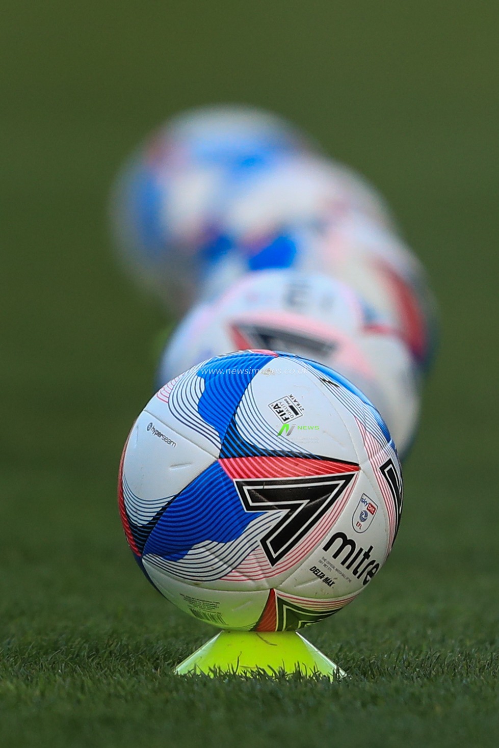 Watfords Mitre Delta Max training balls lined up during the pre-game warmup
