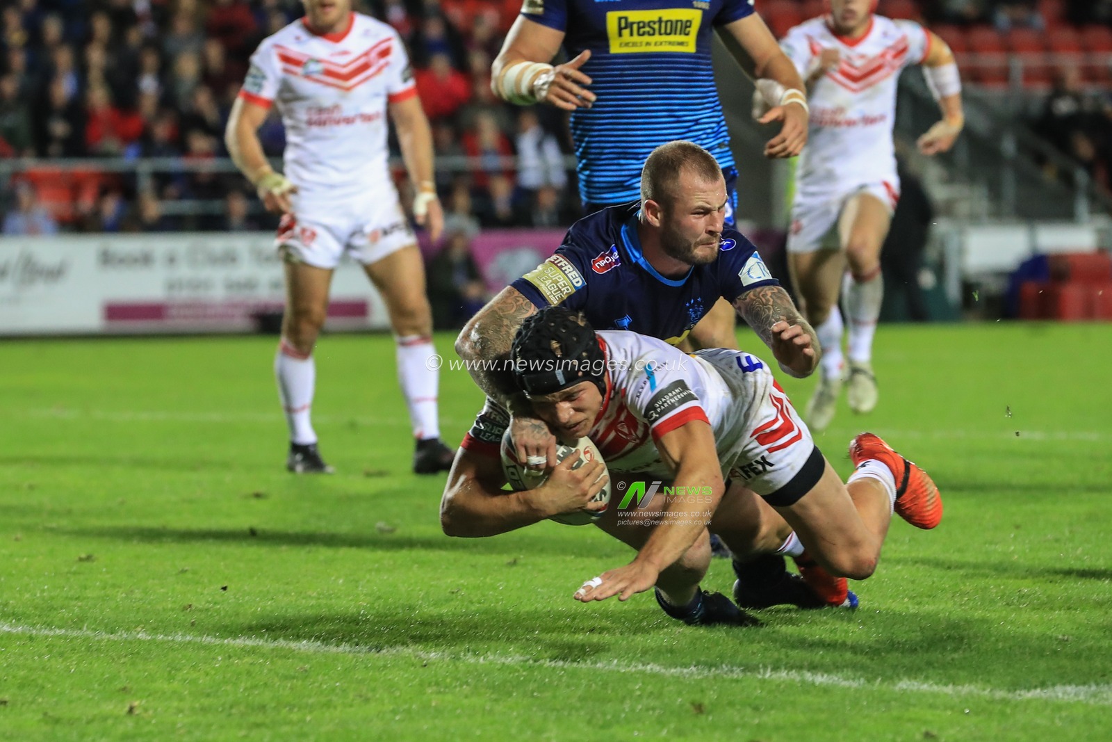 27th September 2019, Totally Wicked Stadium, St Helens, England; Betfred Super League Semi Final, Saint Helens v Wigan Warriors : Jonny Lomax (1) of St Helens goes over for a try 

Credit: Mark Cosgrove/News Images