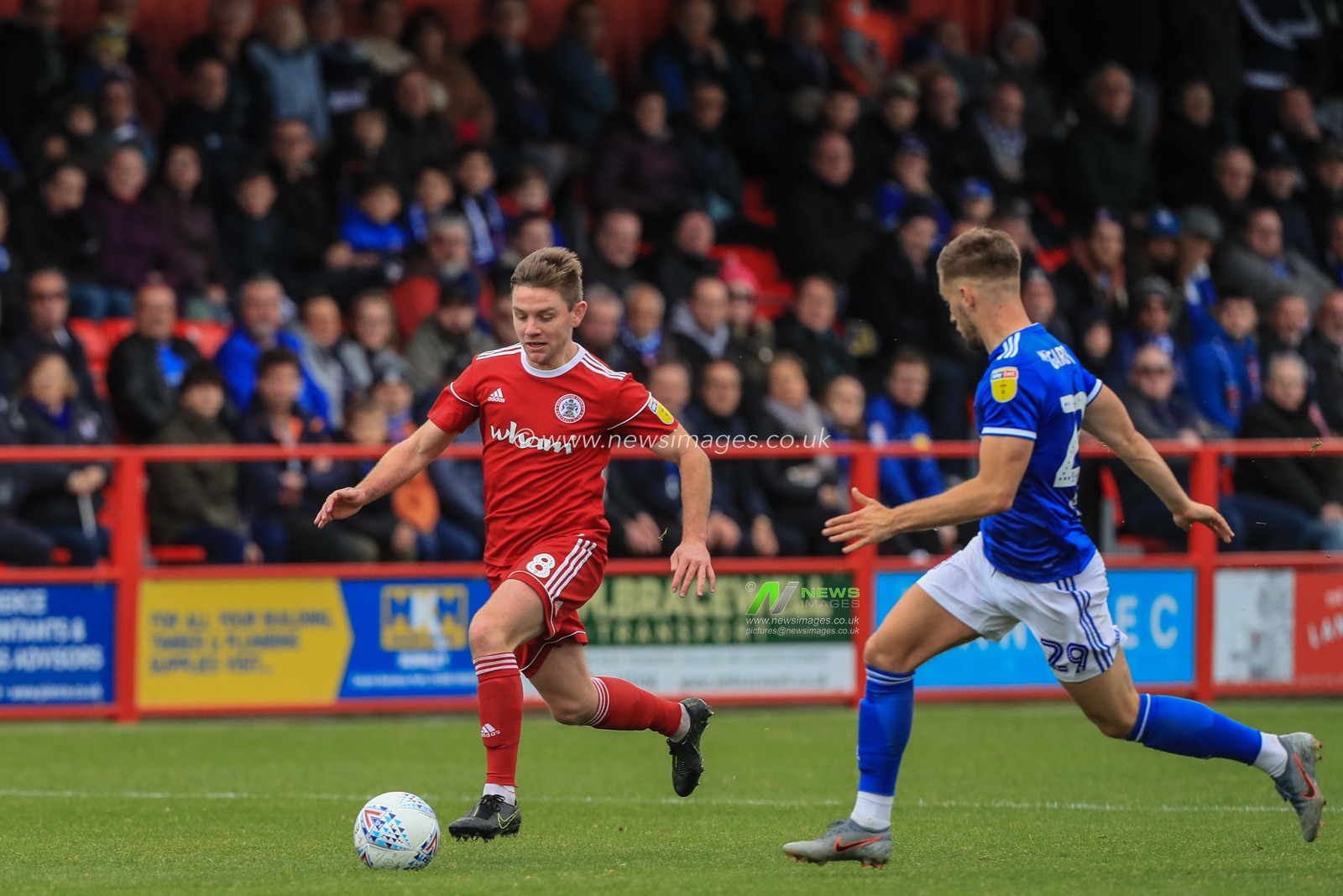 20th October 2019, The Wham Stadium, Accrington, England; Sky Bet League 1, Accrington Stanley v Ipswich Town : Sam Finley of Accrington Stanley makes a break closely tracked by Luke Garbutt of Ipswich Town 

Credit: Mark Cosgrove/News Images