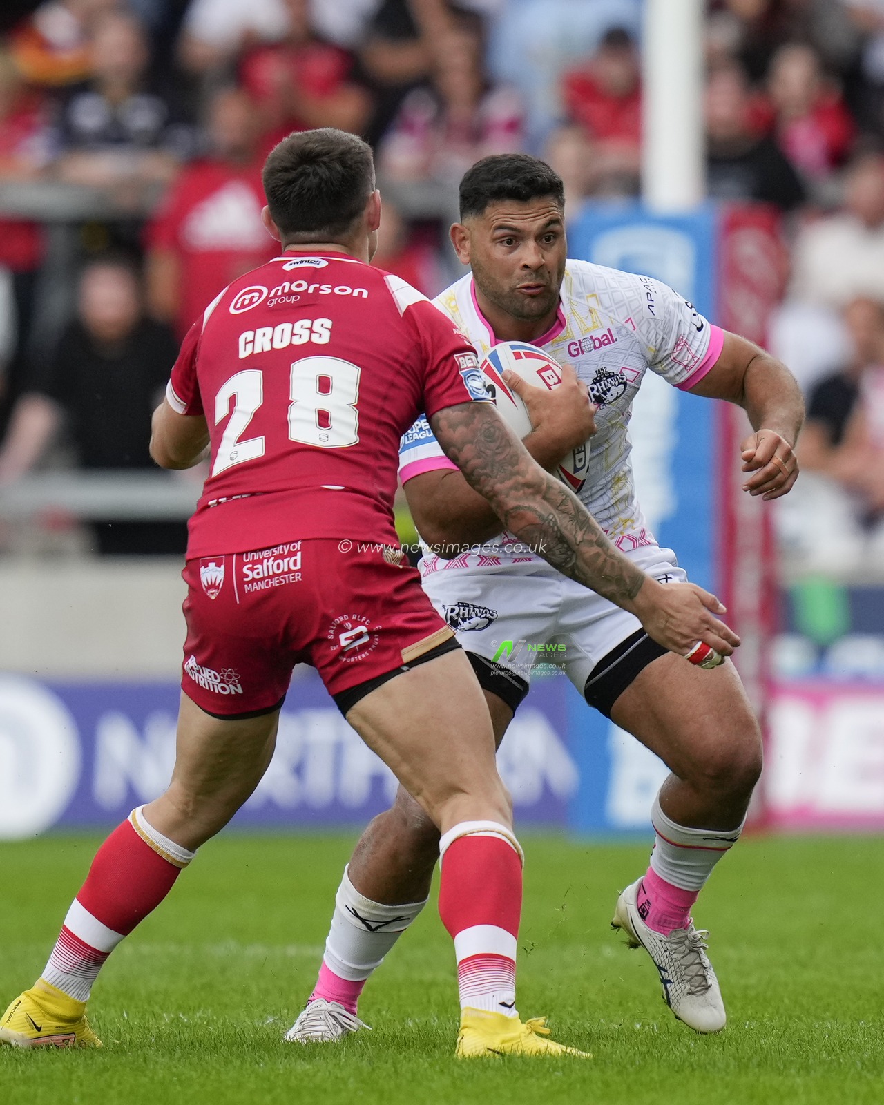 Rhyse Martin #12 of Leeds Rhinos runs at Deon Cross #28 of Salford Red Devils during the Betfred Super League Round 18 match Salford Red Devils vs Leeds Rhinos at AJ Bell Stadium, Eccles, United Kingdom, 9th July 2023

(Photo by Steve Flynn/News Images)