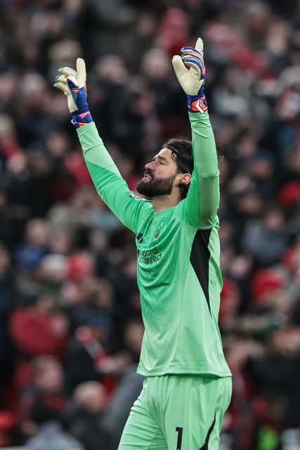 Alisson Becker of Liverpool celebrates a goal during the Premier League match Liverpool vs Wolverhampton Wanderers at Anfield, Liverpool, United Kingdom, 27th December 2025

(Photo by Mark Cosgrove/News Images)

*** GER AUT SUI OUT ***