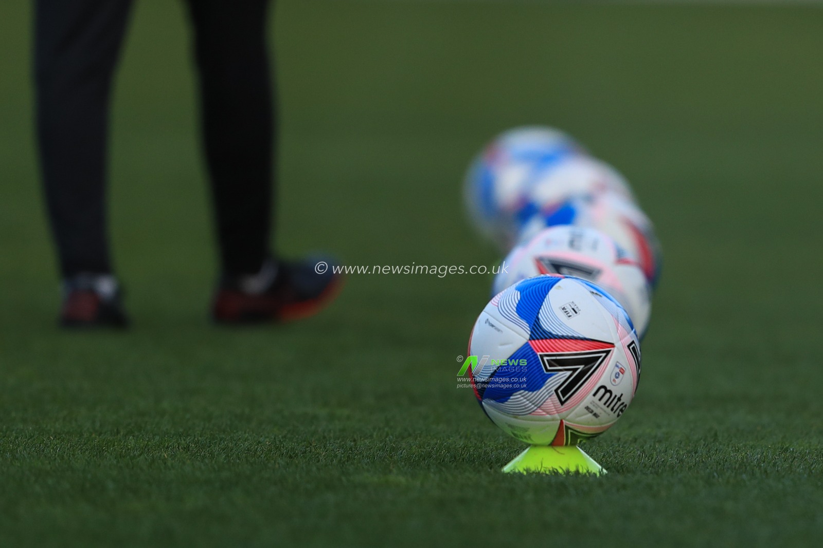 Watfords Mitre Delta Max training balls lined up during the pre-game warmup