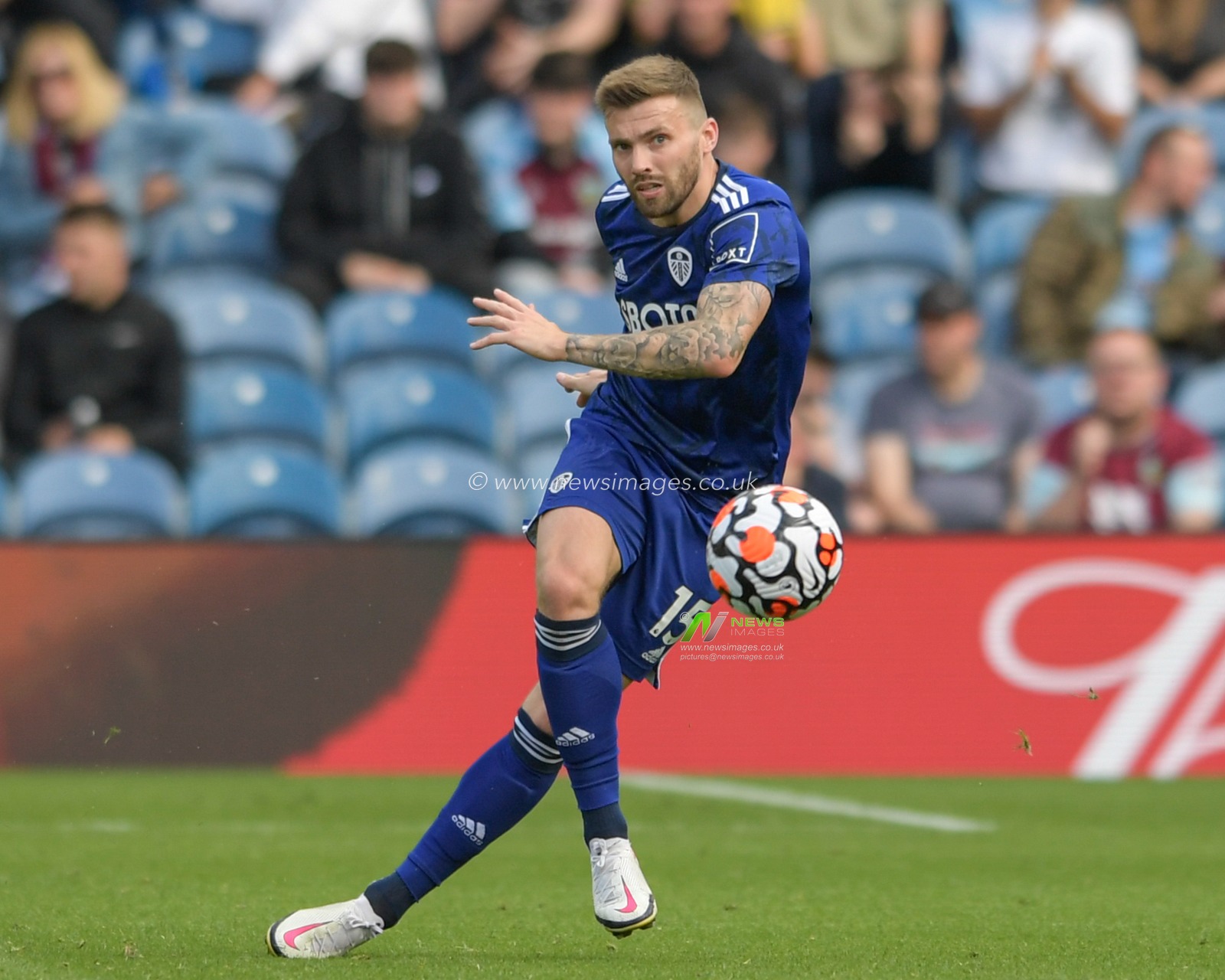 Stuart Dallas #15 of Leeds United clears the ball