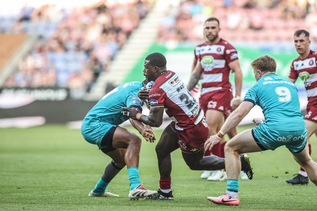 Christian Wade of Wigan Warriors is tackled during the Betfred Super League round 18 match Wigan Warriors vs Huddersfield Giants at The Brick Community Stadium, Wigan, United Kingdom, 11th July 2025

(Photo by Alfie Cosgrove/News Images)