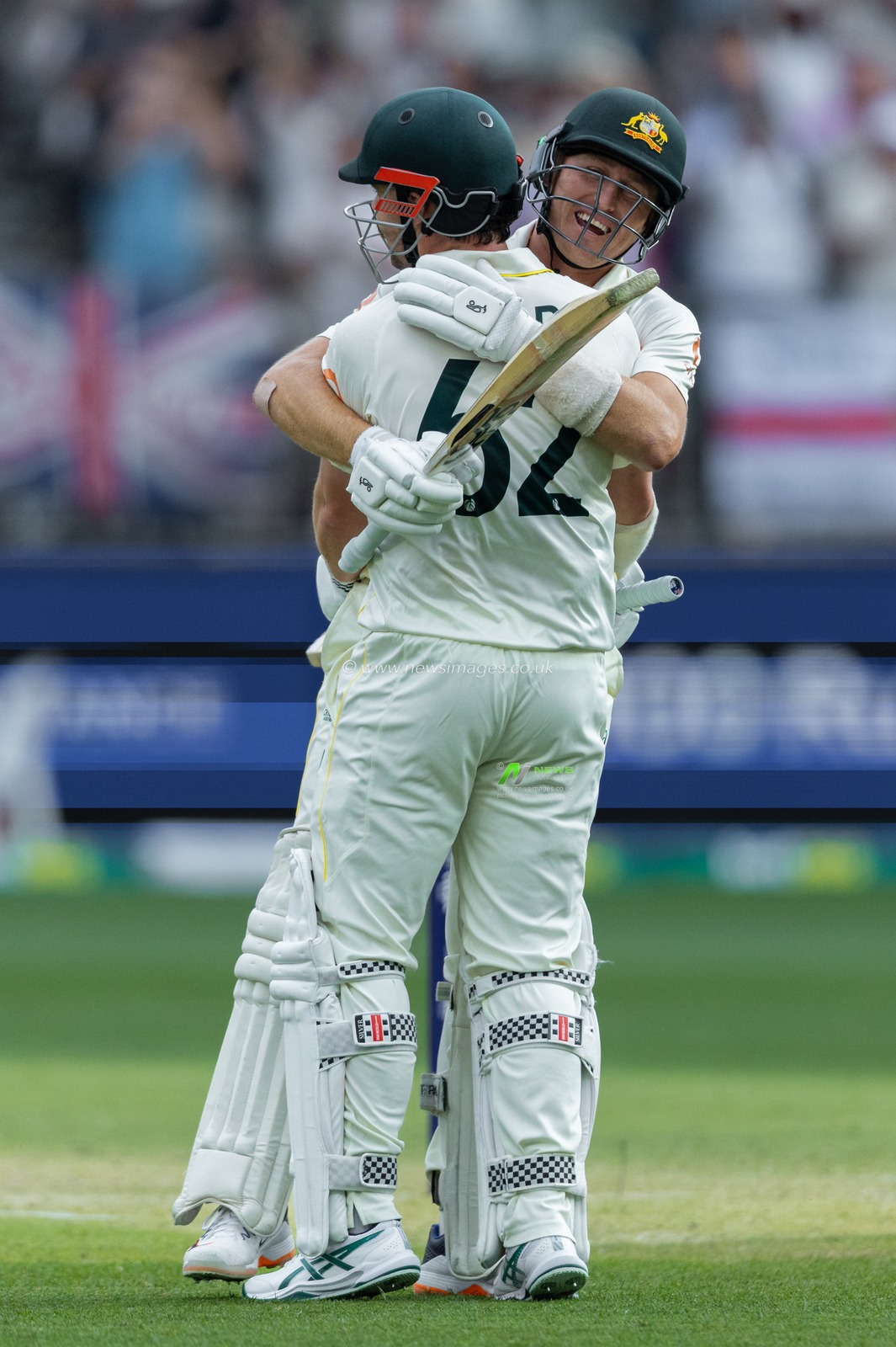 Travis Head of Australia is congratulated by his teammate after scoring a century during the NRMA Insurance Ashes First Test Day 2 Australia vs England at Optus Stadium, Perth, Australia, 22nd November 2025

(Photo by Santanu Banik/News Images)

*** GER AUT SUI OUT ***