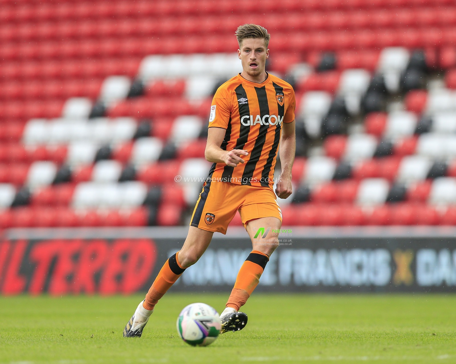 Reece Burke (5) of Hull City in possession