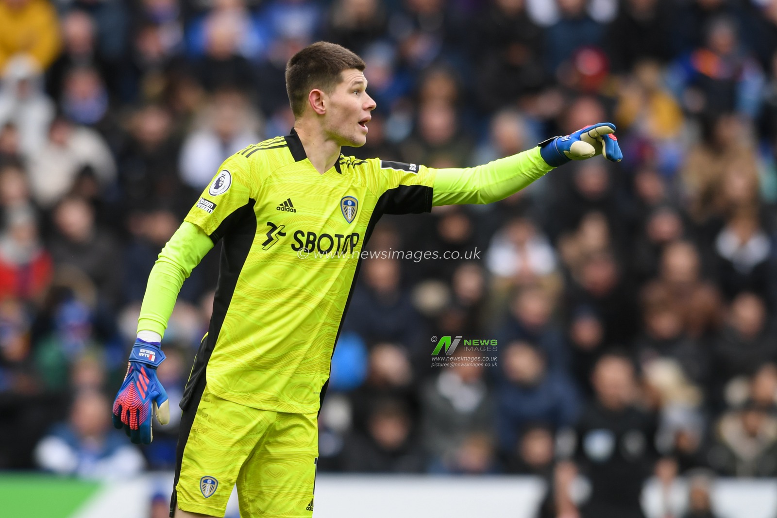 Illan Meslier #1 of Leeds United gives instructions during the game