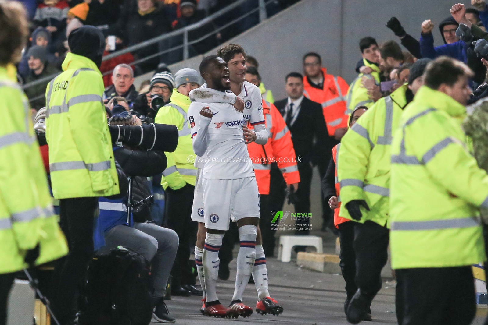 25th January 2020, KC Stadium, Kingston upon Hull, England; Emirates FA Cup, Hull City v Chelsea : Fikayo Tomori (29) and Marcos Alonso (3) of Chelsea celebrate off the pitch