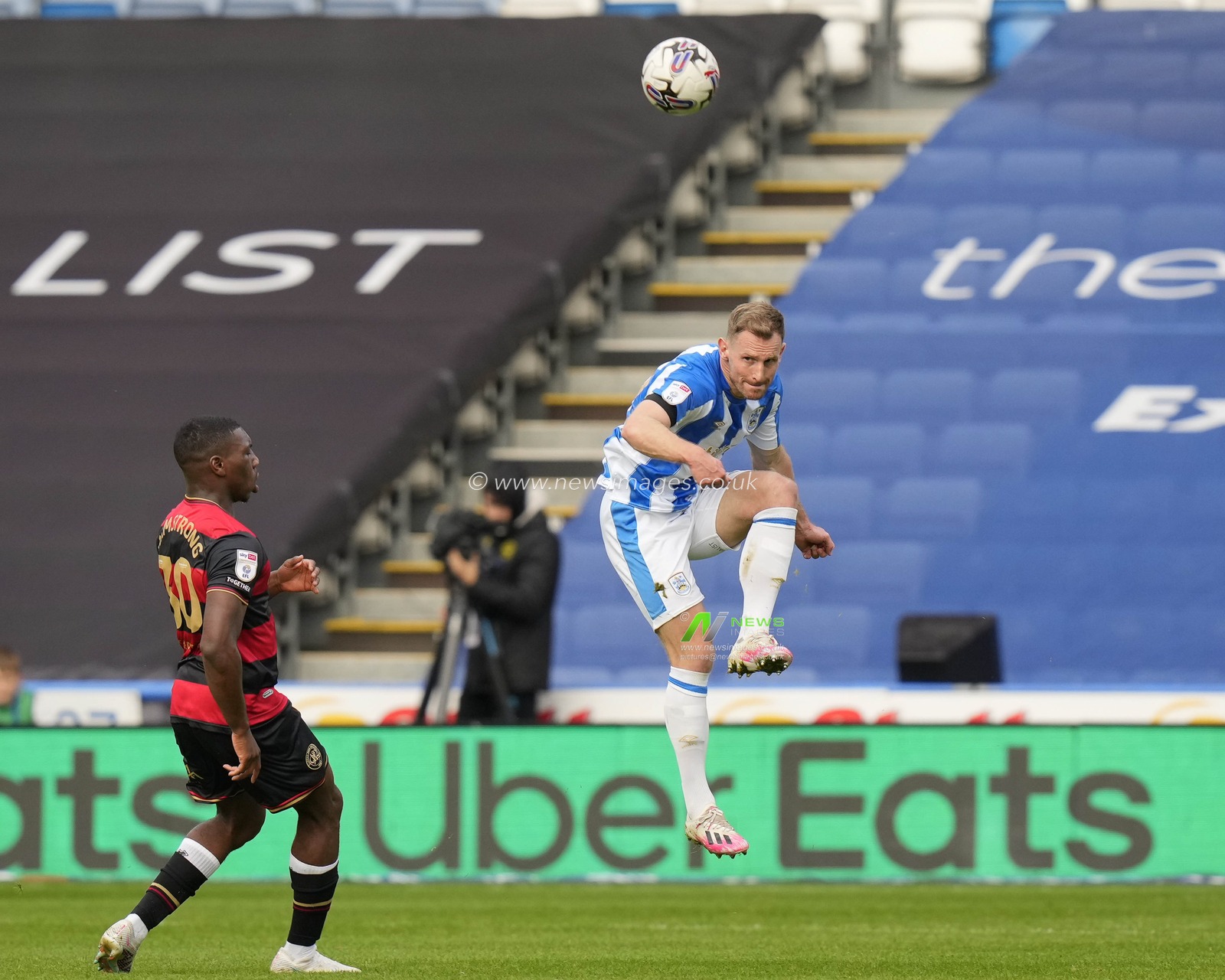 Tom Lees #32 of Huddersfield Town clears the ball during the Sky Bet Championship match Huddersfield Town vs Queens Park Rangers at John Smith's Stadium, Huddersfield, United Kingdom, 21st October 2023

(Photo by Steve Flynn/News Images)