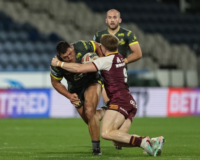 Ryan Hall of Leeds Rhinos is tackled by Zac Woolford of Huddersfield Giants during the Betfred Super League round 8 match Huddersfield Giants vs Leeds Rhinos at Accu Stadium, Huddersfield, United Kingdom on 17 April 2026

(Photo by Mark Cosgrove/News Images)