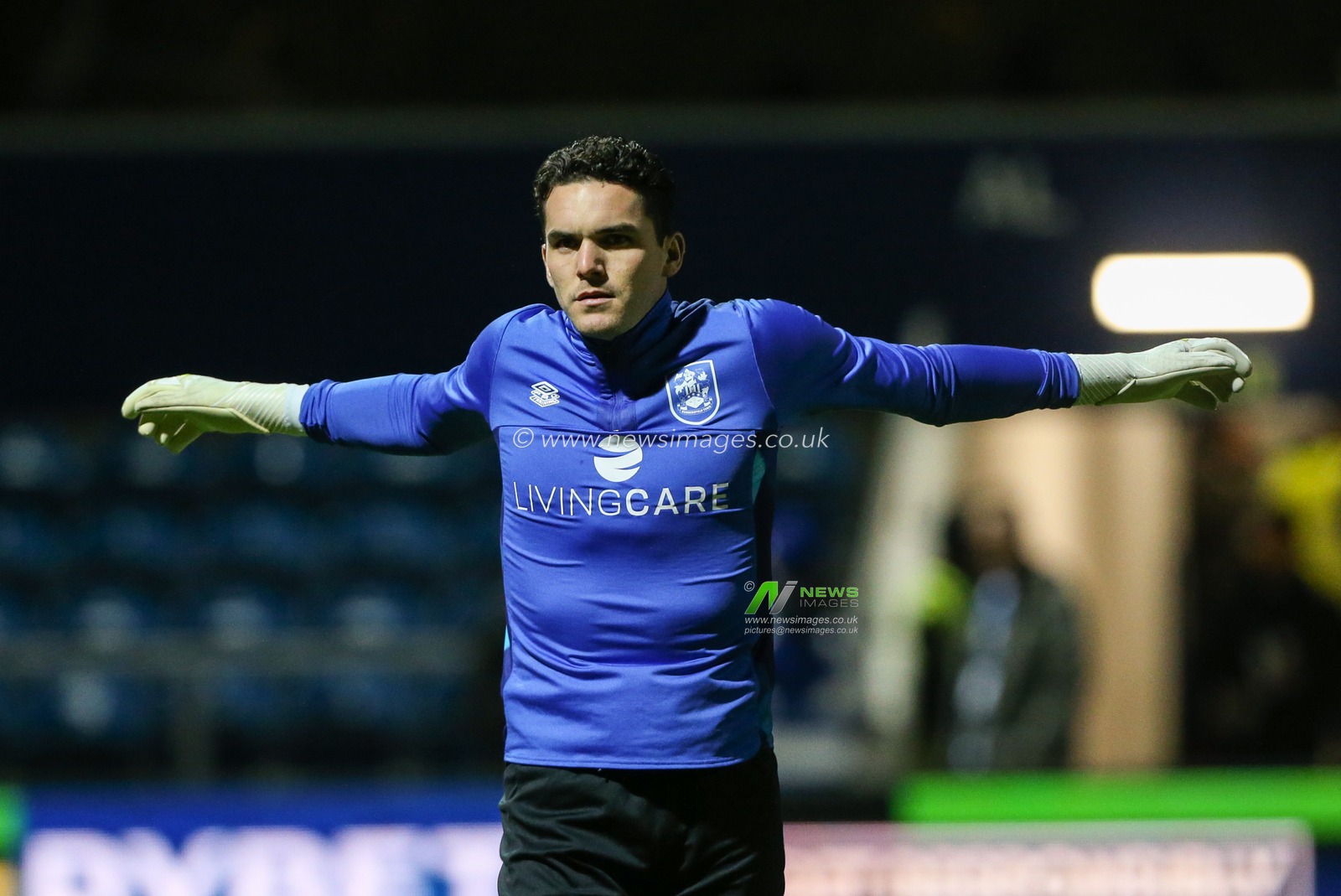 Lee Nicholls #21 of Huddersfield Town warms up during the Sky Bet Championship match Queens Park Rangers vs Huddersfield Town at Kiyan Prince Foundation Stadium, London, United Kingdom, 8th November 2022

(Photo by Arron Gent/News Images)