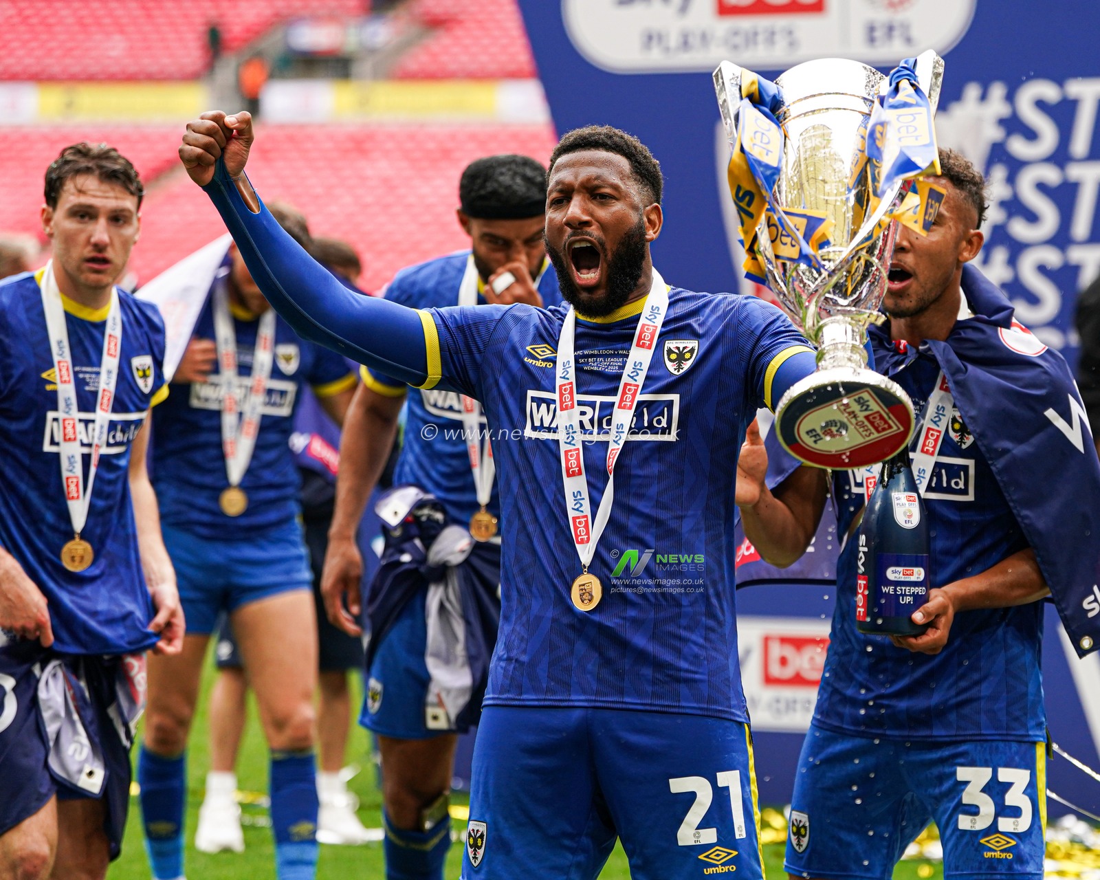 Myles Hippolyte of AFC Wimbledon celebrates after the Sky Bet League 2 Playoff Final match AFC Wimbledon vs Walsall at Wembley Stadium, London, United Kingdom, 26th May 2025

(Photo by Harvey Murphy/News Images)