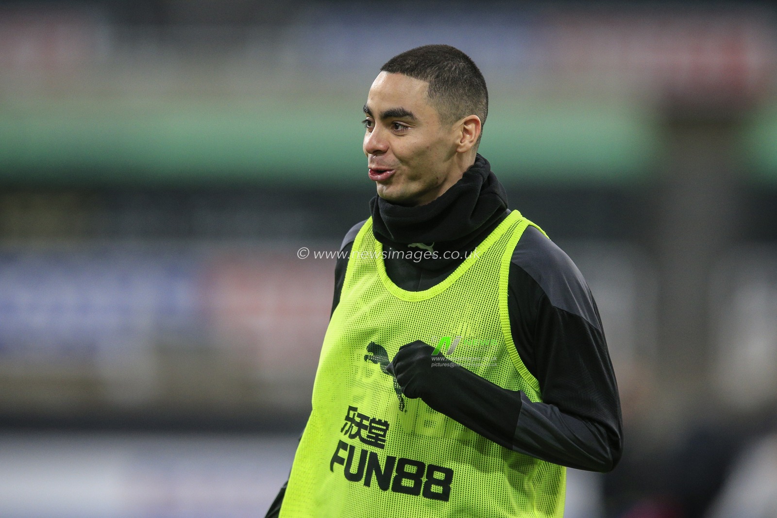 Miguel AlmirÃ³n #24 of Newcastle United during the pre-game warmup