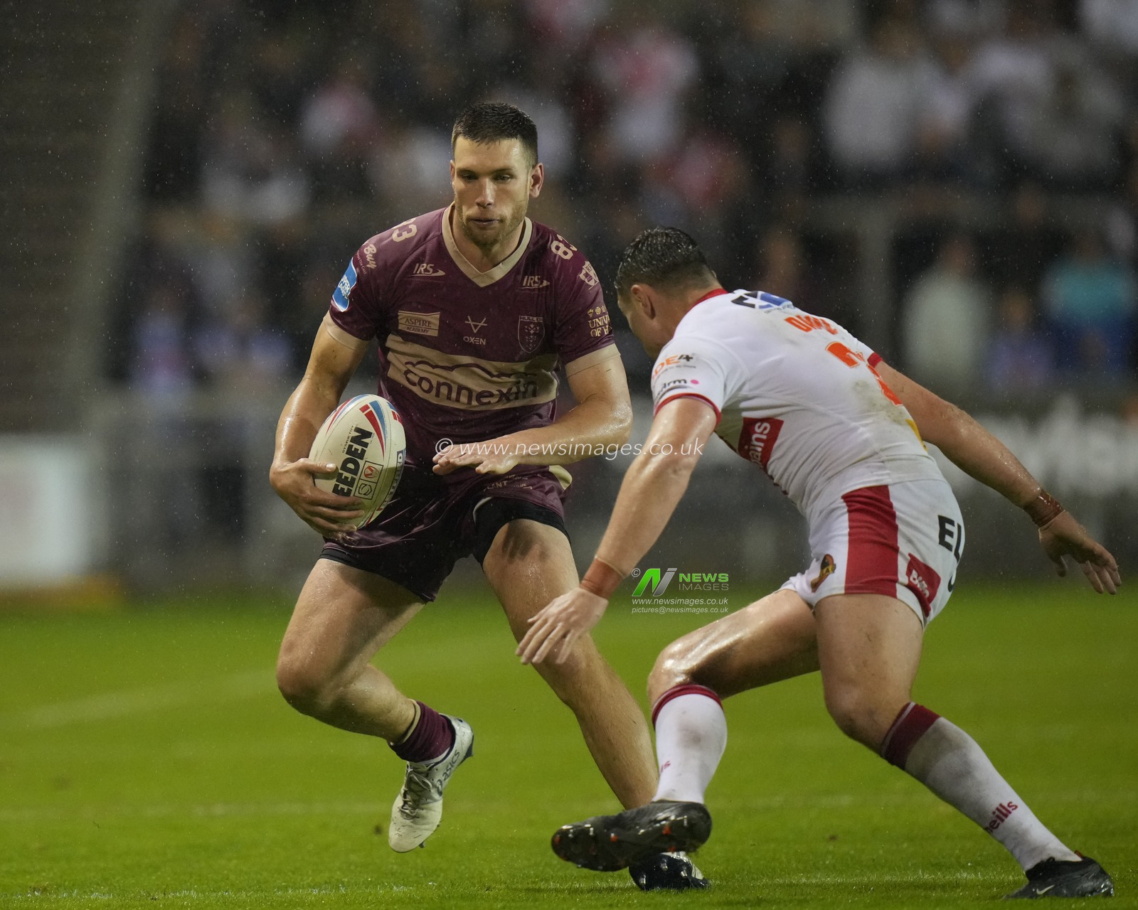 Tom Opacic #3 of Hull KR runs at Ben Davies #21 of St. Helens during the Betfred Super League Round 22 match St Helens vs Hull KR at Totally Wicked Stadium, St Helens, United Kingdom, 18th August 2023

(Photo by Steve Flynn/News Images)