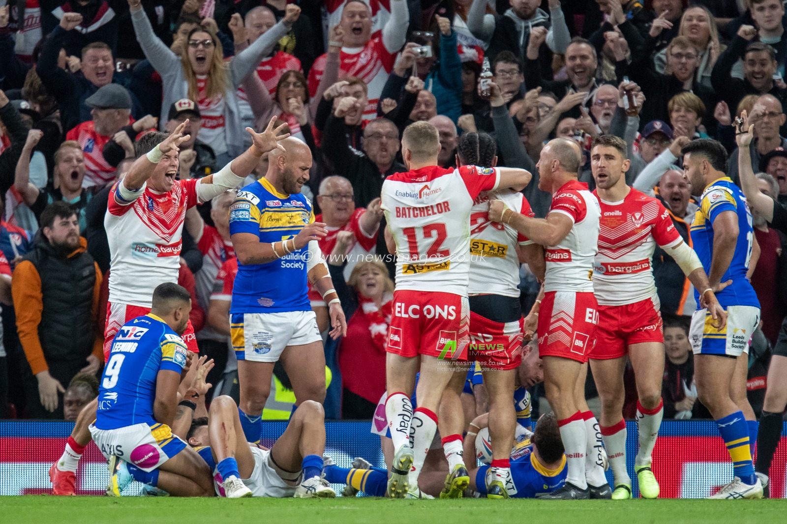 Konrad Hurrell #23 of St Helens celebrates his try and makes the score 16-6 during the 25th Betfred Super League Grand Final match St Helens vs Leeds Rhinos at Old Trafford, Manchester, United Kingdom, 23rd September 2022

(Photo by James Heaton/News Images)