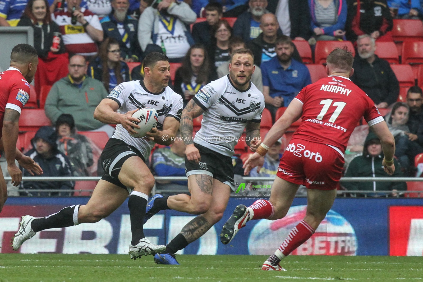 25th May 2019 , Anfield Stadium, Liverpool, England; Dacia Magic Weekend, Betfred Super League Round 16, Hull FC vs Huddersfield Giants ; Mark Minichiello (12) of Hull FC runs with the ball

Credit: David Greaves/News Images