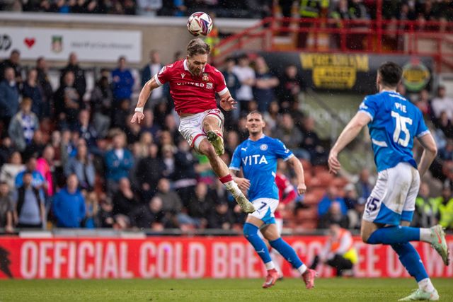 Wrexham's Sam Smith heads towards goal during the Sky Bet League 1 match Wrexham vs Stockport County at SToK Cae Ras, Wrexham, United Kingdom, 22nd March 2025

(Photo by Nik Mesney/News Images)