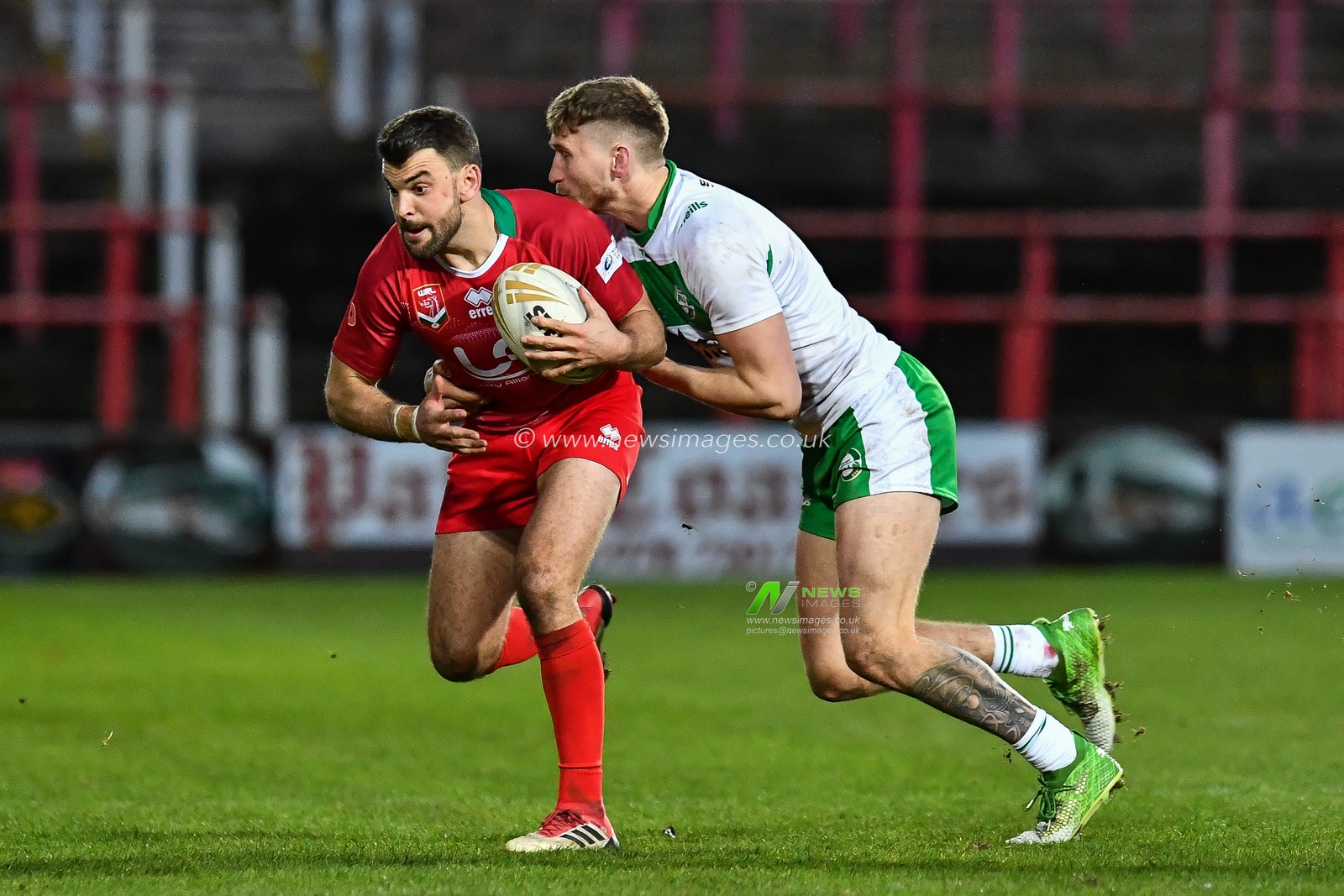 11th November 2018 , Racecourse Ground,  Wrexham, Wales ;  Rugby League World Cup Qualifier,Wales v Ireland ; Elliot Kear of Wales is tackled by Ethan Ryan of Ireland 


Credit:   Craig Thomas/News Images