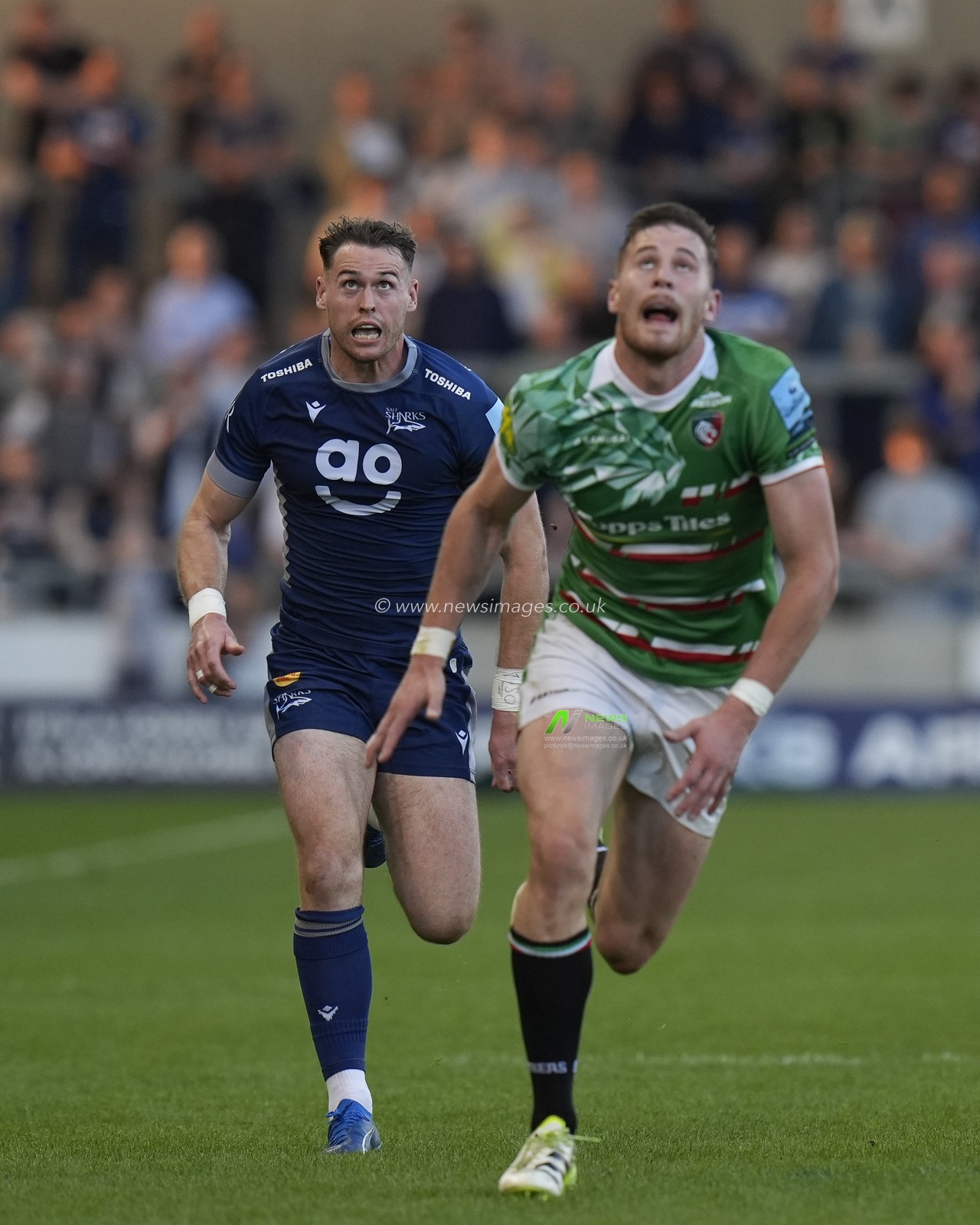 Sale Sharks wing Tom Roebuck and Leicester Tigers full-back Freddie Steward chase a kick during the Gallagher Premiership match Sale Sharks vs Leicester Tigers at Salford Community Stadium, Eccles, United Kingdom, 10th May 2024

(Photo by Steve Flynn/News Images)
