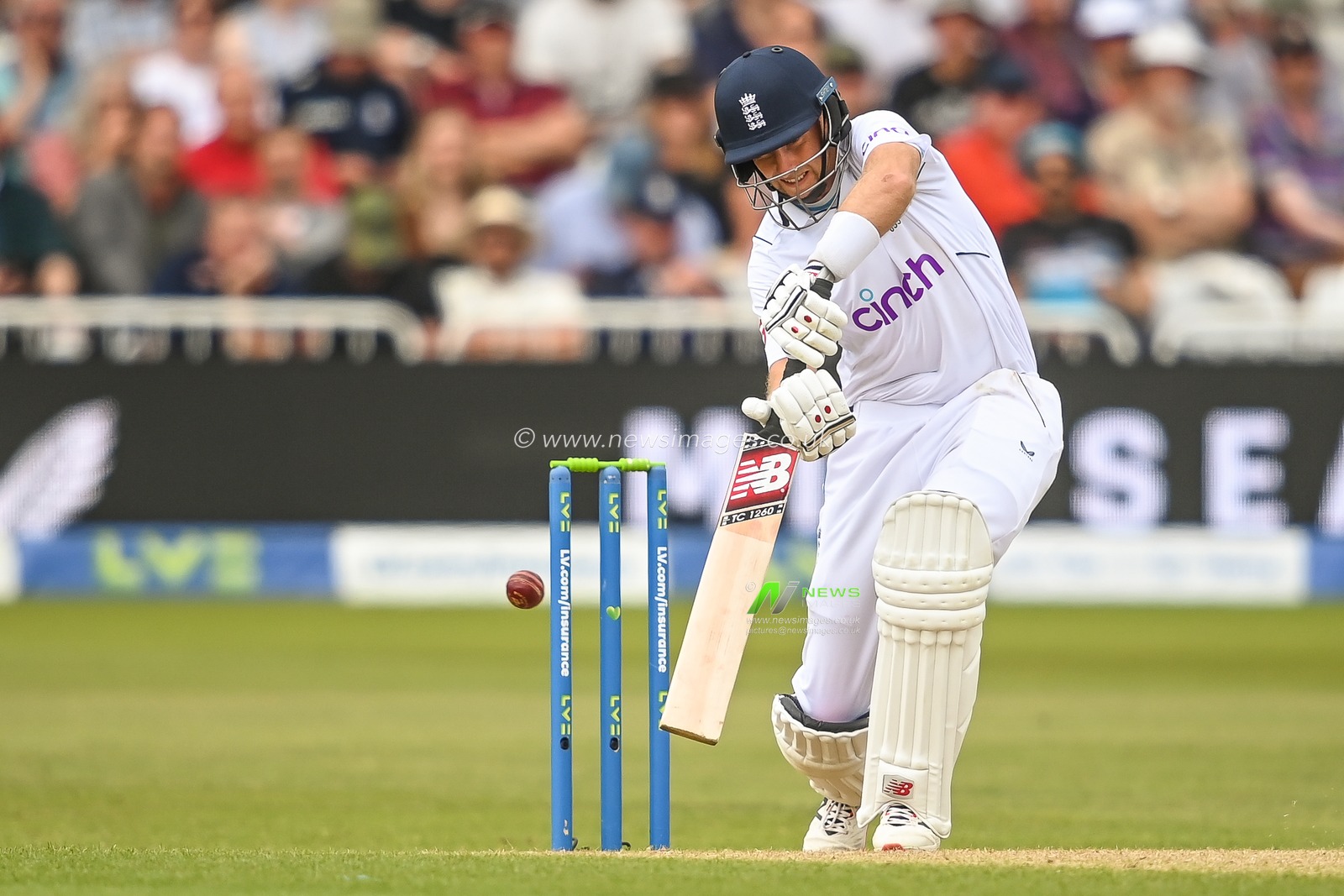 Joe Root of England drives the ball