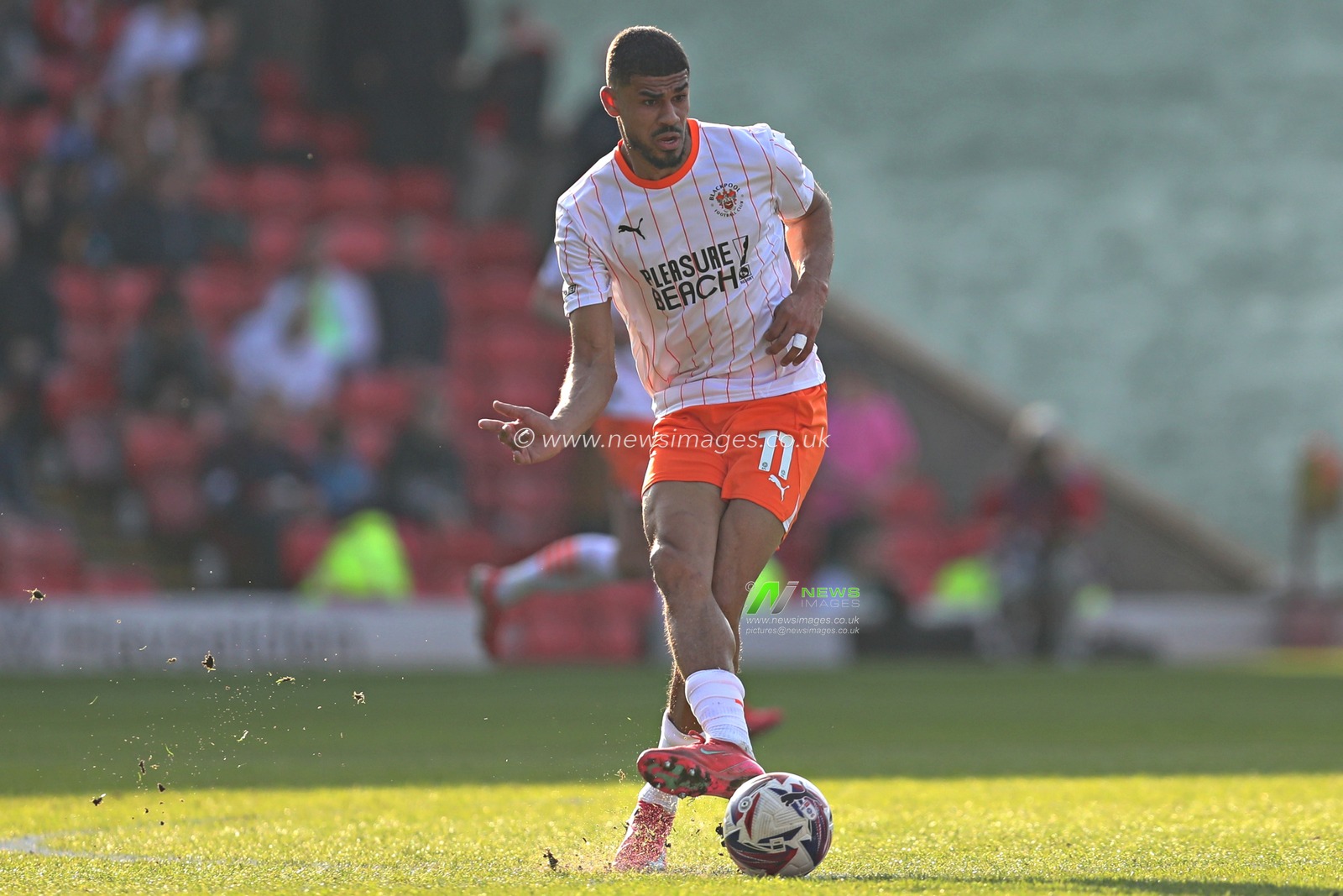 Ashley Fletcher of Blackpool F.C. passes forward during the Sky Bet League 1 match Barnsley vs Blackpool at Oakwell, Barnsley, United Kingdom, 8th March 2025

(Photo by Sam Eaden/News Images)