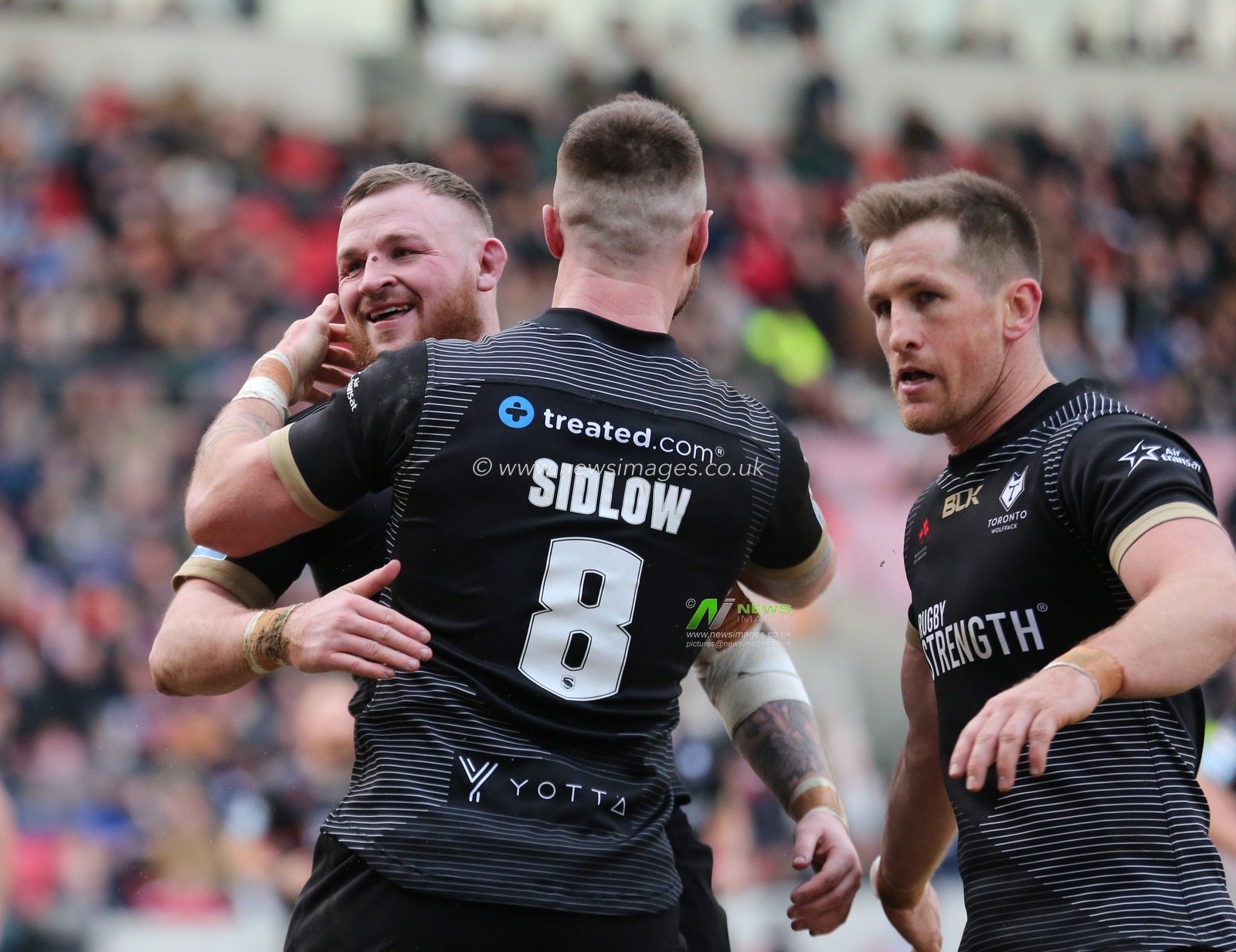 8th February 2020, AJ Bell Stadium, Eccles, England; Betfred Super League, Salford Red Devils v Toronto Wolfpack : Brad Singleton (L) of Toronto Wolfpack celebrates scoring his try against Salford Red Devils with his team mates.