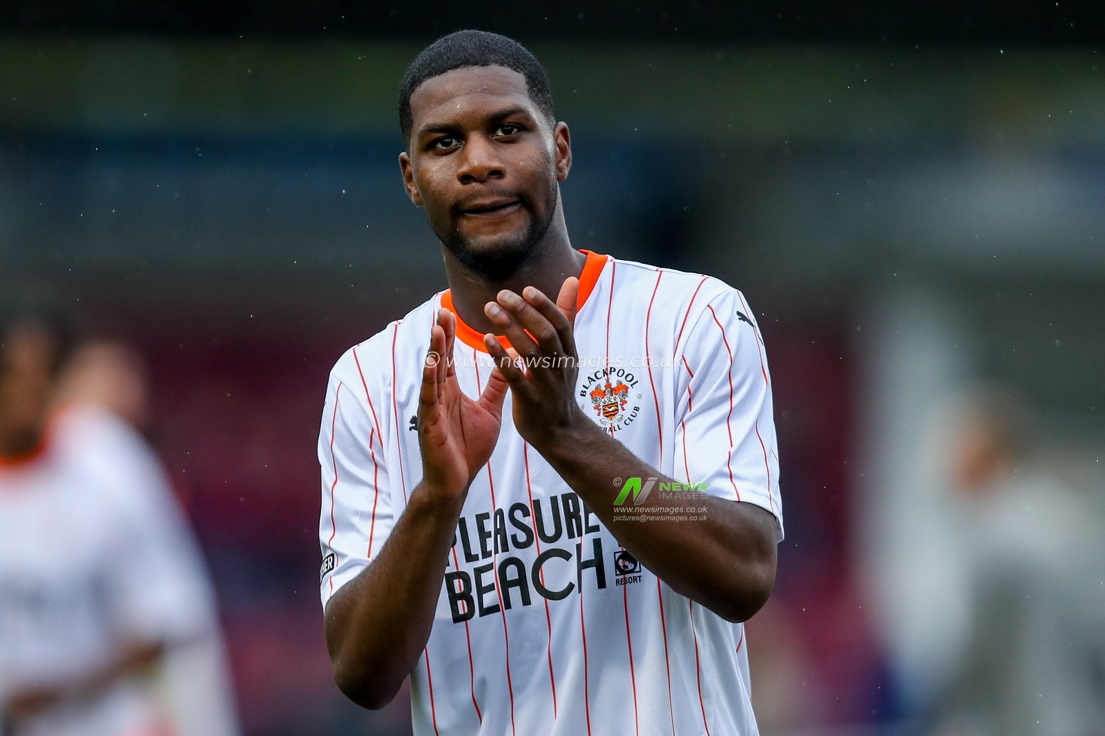 Odeluga Offiah of Blackpool acknowledges the fans after the teams victory following the Sky Bet League 1 match Northampton Town vs Blackpool at Sixfields Stadium, Northampton, United Kingdom, 22nd March 2025

(Photo by Izzy Poles/News Images)