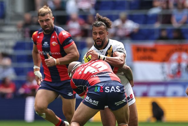 Ashton Golding of Castleford Tigers is tackled by Jazz Tevaga of Wakefield Trinity during the Betfred Super League Magic Weekend match Wakefield Trinity vs Castleford Tigers at Hill Dickinson Stadium, Liverpool, United Kingdom on 05 July 2026

(Photo by Mark Cosgrove/News Images)