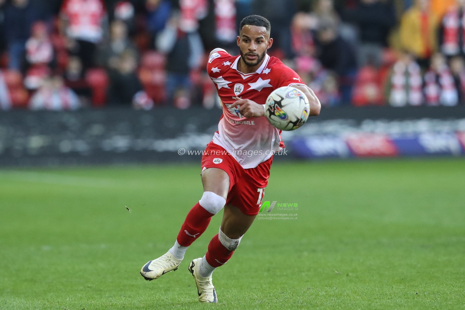Barry Cotter of Barnsley breaks with the ball during the Sky Bet League 1 match Barnsley vs Derby County at Oakwell, Barnsley, United Kingdom, 24th February 2024

(Photo by Alfie Cosgrove/News Images)