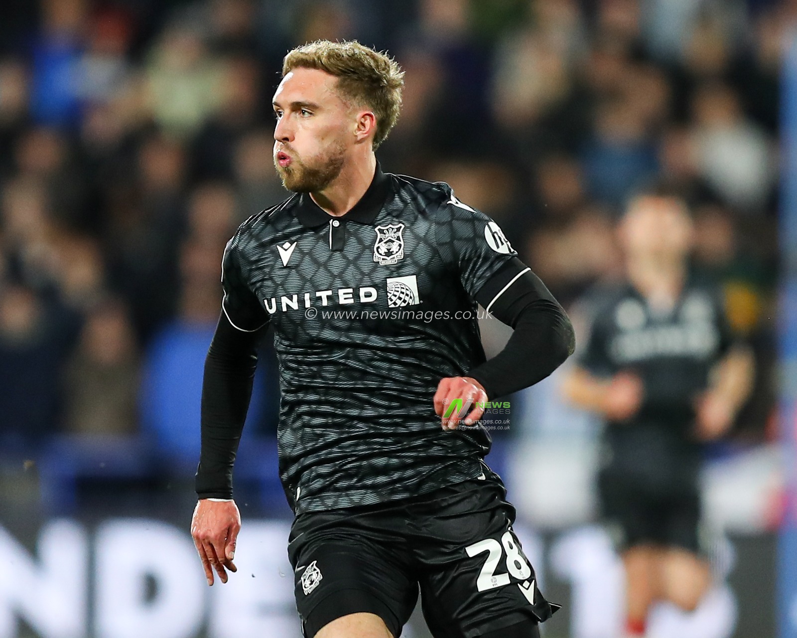 Sam Smith of Wrexham during the Sky Bet League 1 match Huddersfield Town vs Wrexham at John Smith's Stadium, Huddersfield, United Kingdom, 4th March 2025

(Photo by Jorge Horsted/News Images)