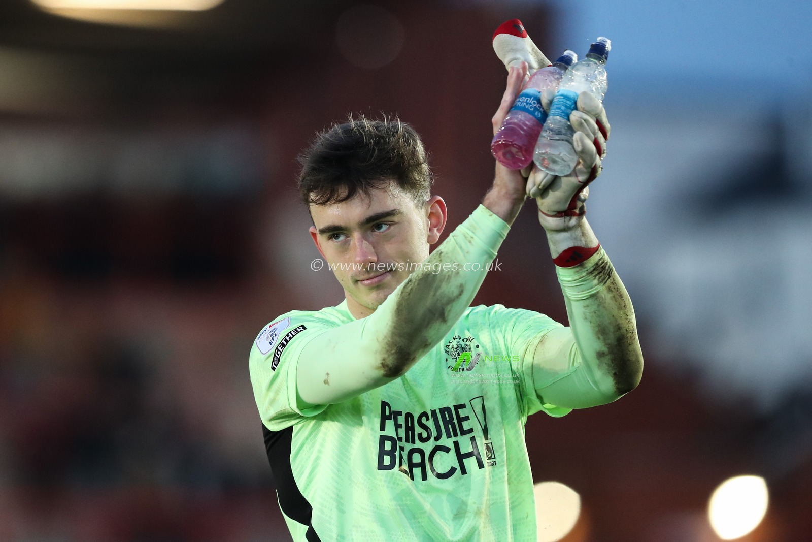 Harry Tyrer of Blackpool applauds the travelling fans after the Sky Bet League 1 match Exeter City vs Blackpool at St James' Park, Exeter, United Kingdom, 25th January 2025

(Photo by Gareth Evans/News Images)
