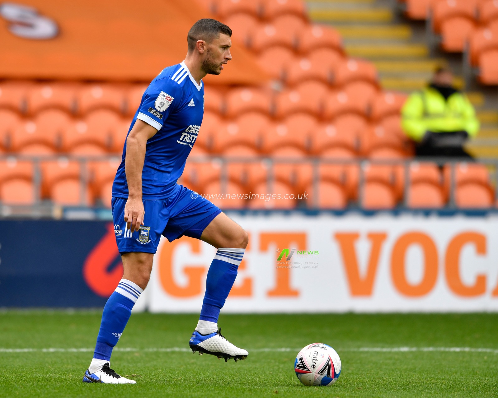 James Wilson (5) of Ipswich Town starts an attacking move