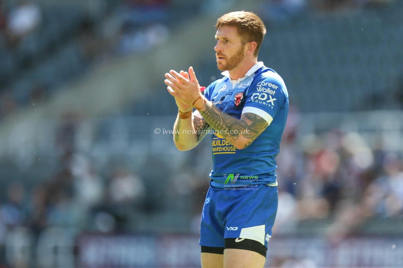 Marc Sneyd #7 of Salford Red Devils encourages his team mates