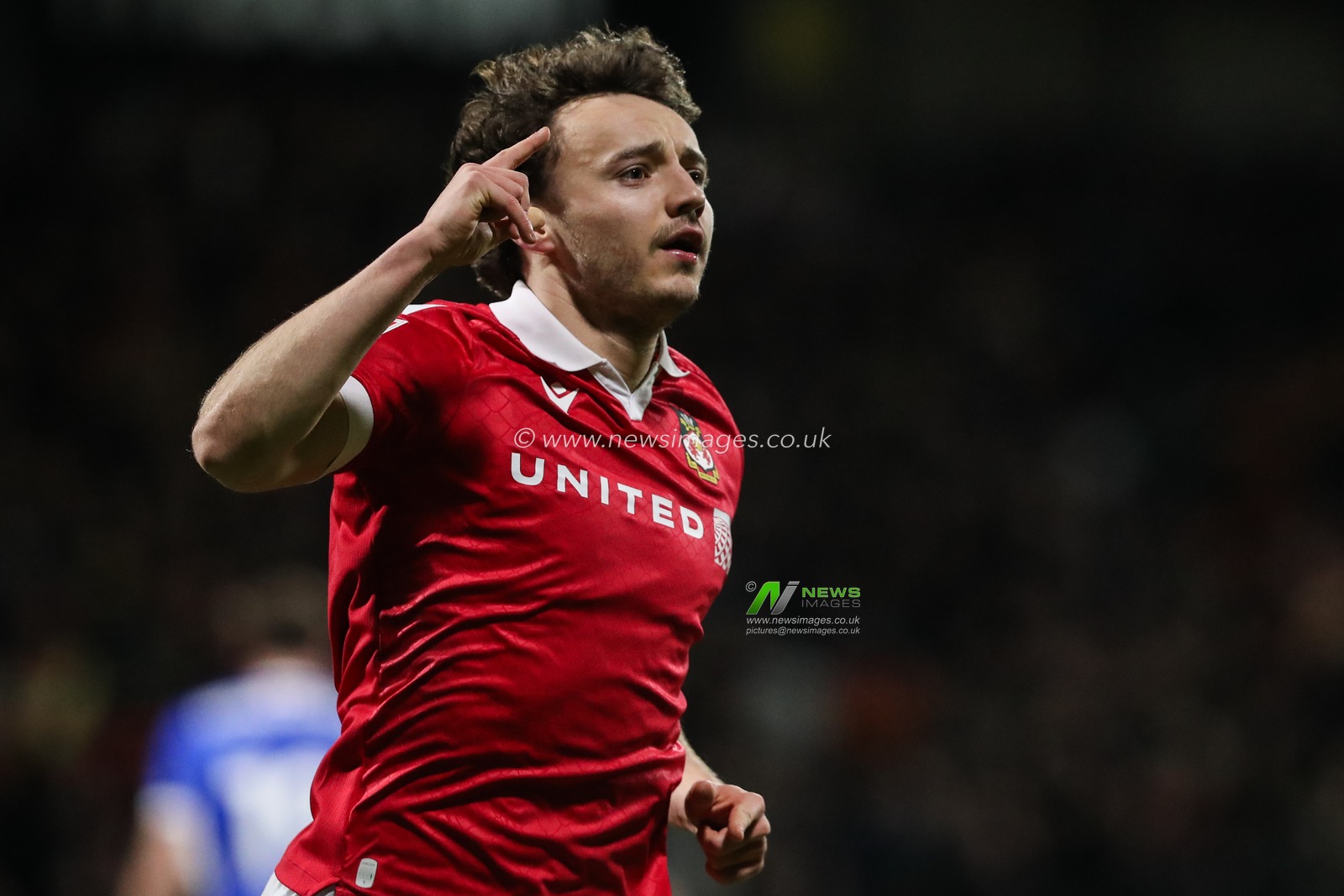 Ollie Rathbone of Wrexham celebrates his goal to make it 1-0 during the Sky Bet League 1 match Wrexham vs Birmingham City at SToK Cae Ras, Wrexham, United Kingdom, 23rd January 2025

(Photo by Gareth Evans/News Images)