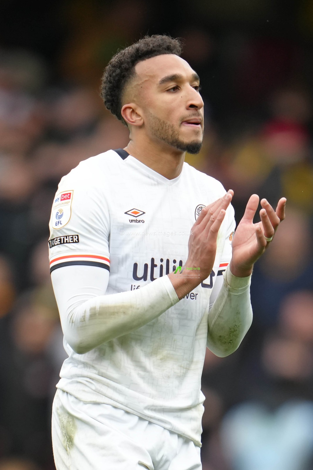 Jacob Brown of Luton Town applauds away supporters after the Sky Bet Championship match Watford vs Luton Town at Vicarage Road, Watford, United Kingdom, 23rd February 2025

(Photo by Harvey Murphy/News Images)
